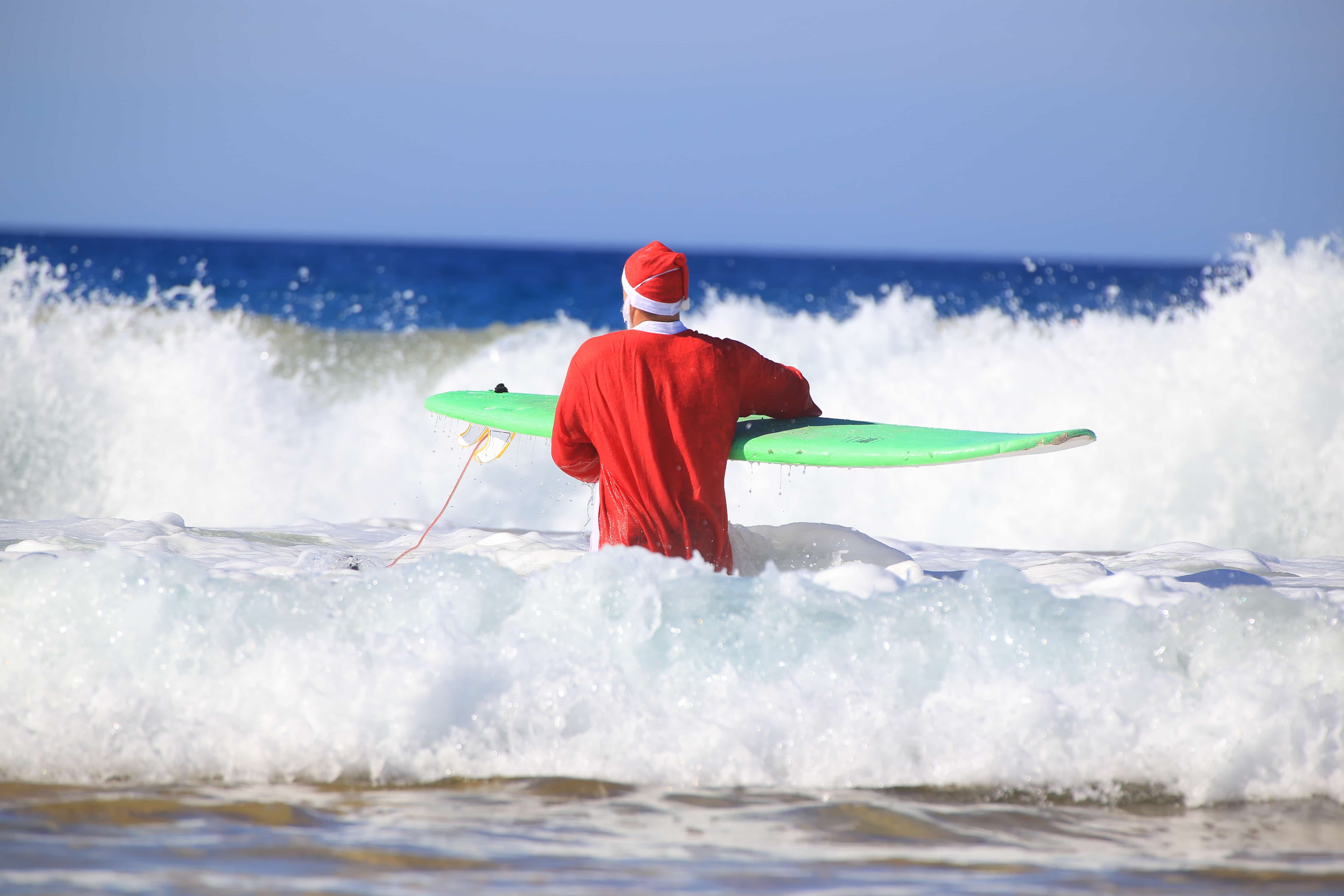 Check Out The Surfin' Santa Arrival At Seaport Village! | Encinitas, CA