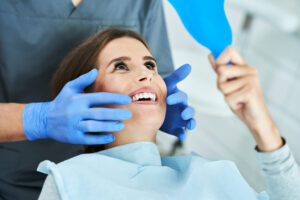 woman receiving oral health evaluation gum disease treatment concept